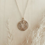 head vs heart talisman necklace