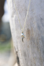 conch charm necklace