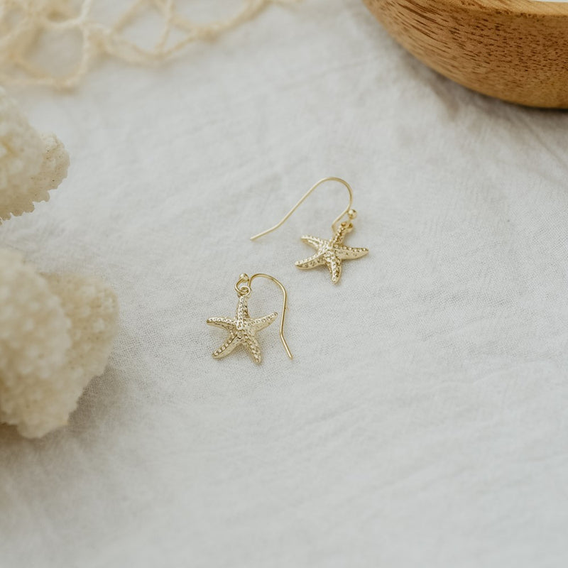starry seashell earrings